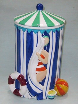 WOMAN IN BEACH TENT COOKIE JAR