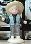 Kim Anderson Child Dressed As Cowboy Mini Figurine