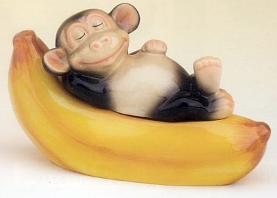 MONKEY SLEEPING ON A BANANA SALT AND PEPPER SHAKERS