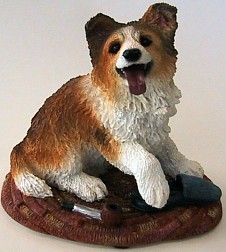 SHELTIE PUPPY PLAYING WITH SHOE AND PIPE MEDIUM DOG FIGURINE