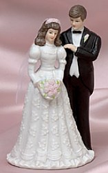 CERAMIC BRIDE AND GROOM FIGURINE